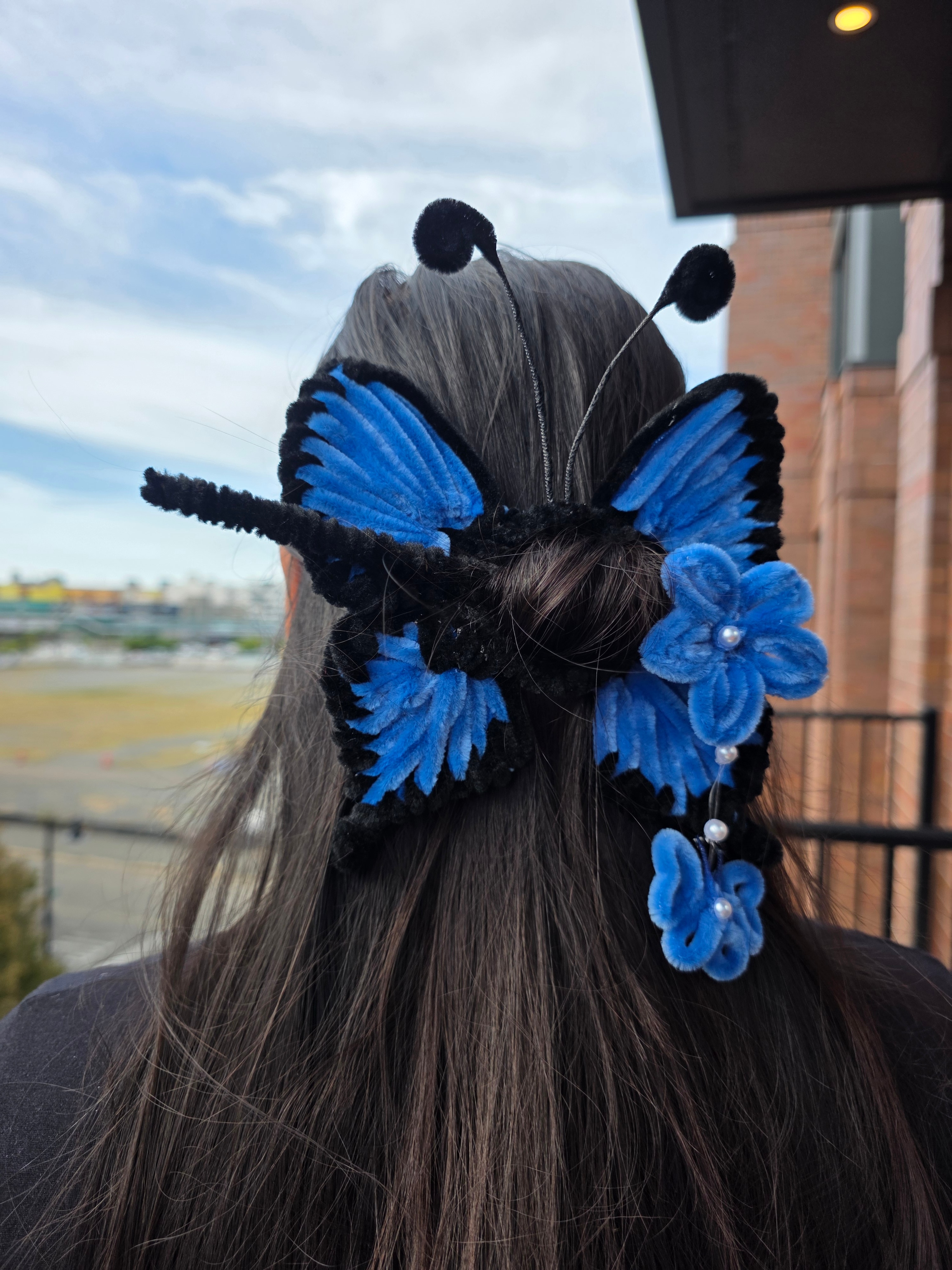 Royal Blue Butterfly Bun Gajra β A handcrafted hair accessory collection featuring the bold Royal Blue Butterfly Bun Gajra, each paired with a matching decorative hair stick.